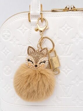 Authentic Louis Vuitton Gold Padlock 🔐 + Unbranded Cat Tan Pom Pom Charm